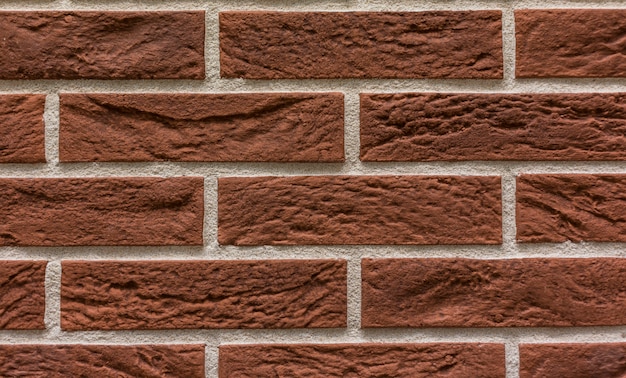 Tile in the form of bricks stone wall  texture background