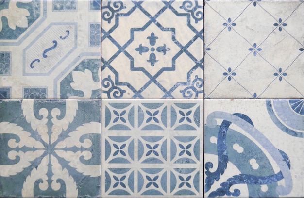 Tile texture on the wall. Decorative insert. Mosaic art. Roman style. Architectural tile insert.