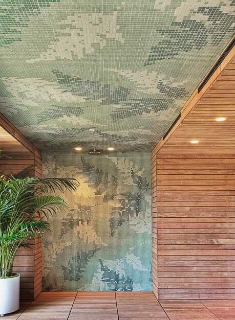 Tiled and wooden wall in shower with potted plant