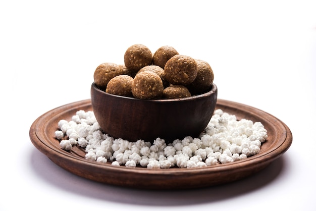 Tilgul or Til Gul with haldi Kumkum and halwa, chiranji or sugar balls for makar sankranti festival