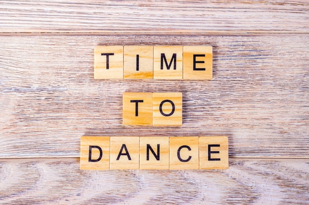 "Time To Dance" text on wooden cubes