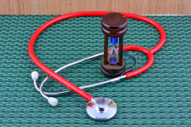 Time for health,stethoscope with hourglass