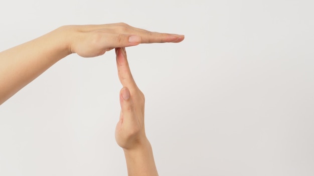 Time out hands gesture on white background