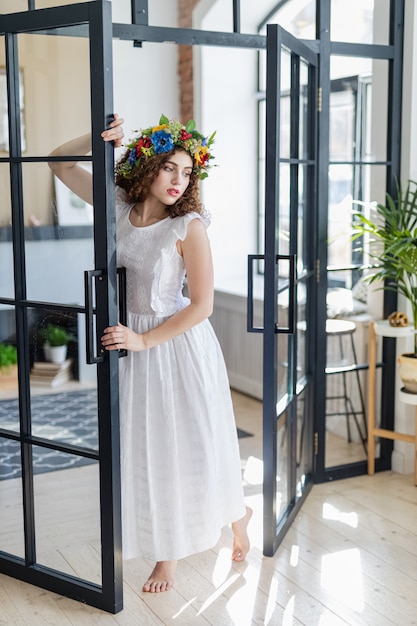 Time to relax. Cheerful young beautiful woman with smile while sitting at her working place