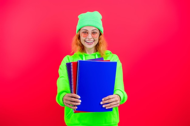 Time to study Knowledge and education School education Students life Woman back to school Knowledge day Education in university Woman student isolated on pink September 1 Selective focus