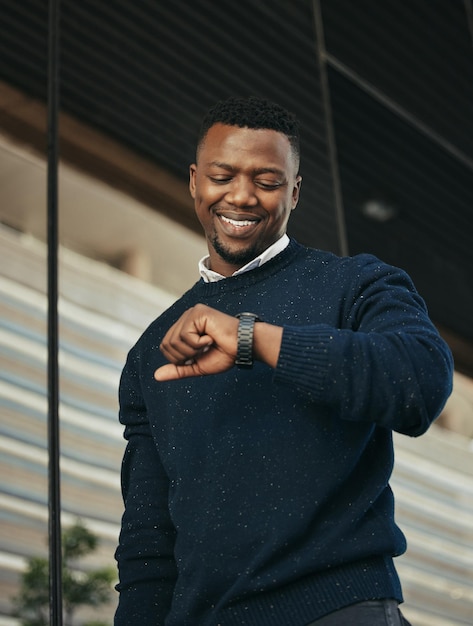 Time watch or deadline with a businessman looking at his wristwatch to check the hour for travel an appointment or a schedule Corporate employee at the airport for international or global business