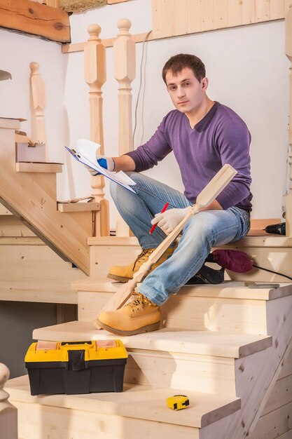 Timmerman op ladder