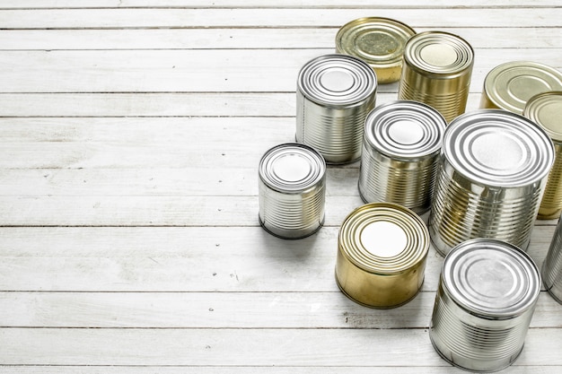 Tin cans with food.