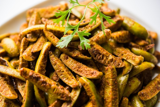 Tindora Sabzi or Tendli or tondli Fry also known as Ivy Gourd fry recipe. selective focus