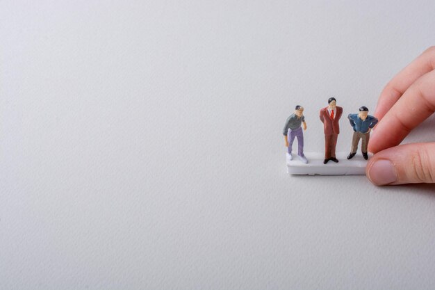 Tiny figurines of men model in view