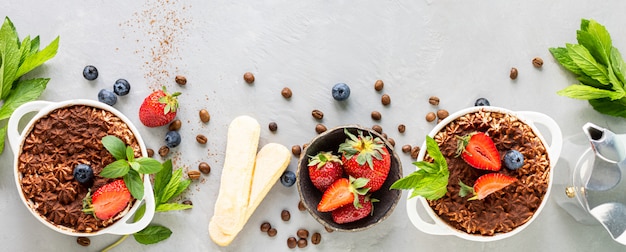 Tiramisu dessert and ingredients for cooking. Banner. Top view.