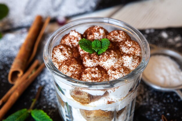 Tiramisu dessert with mascarpone cream and cocoa