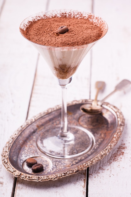 Tiramisu, traditional italian dessert in a glass