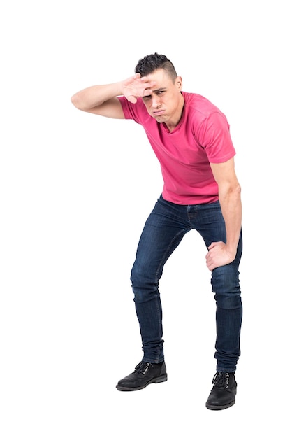 Tired male wiping sweat from forehead