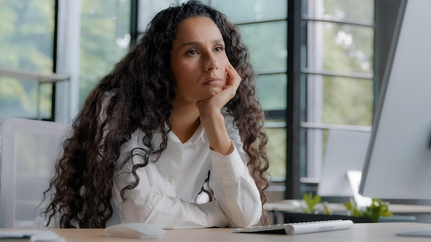 Tired sleepy bored woman sitting in office falling asleep at workplace exhaustion from overworked