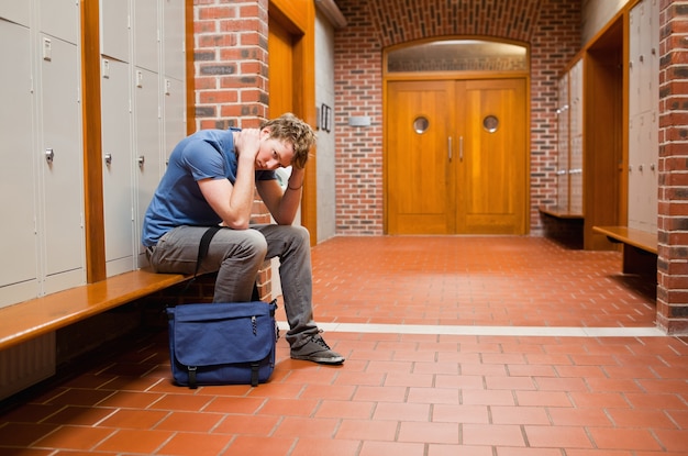 Tired student sitting