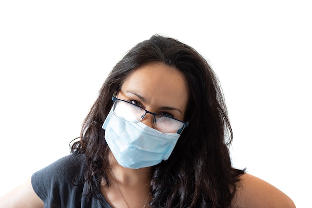 Tired woman wearing black tshirt face mask and misted glasses on white background