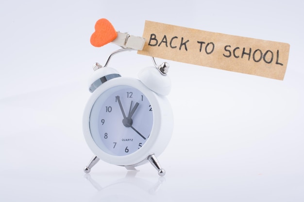 The title back to school and an alarm clock