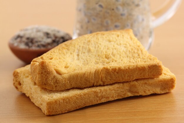 Toast biscuits with herbal juice close up