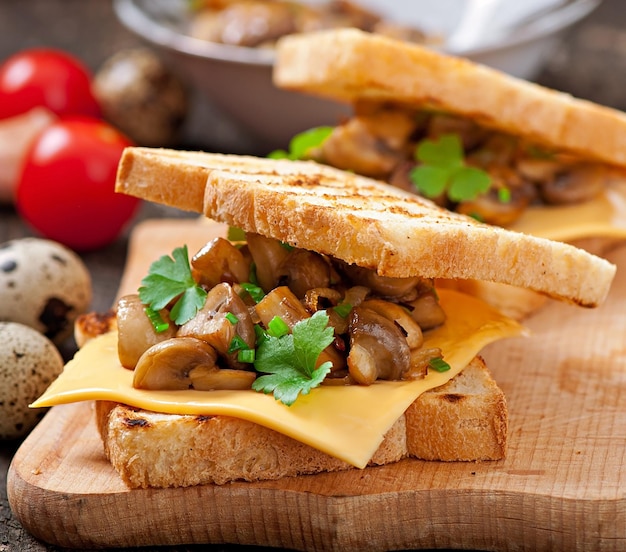 Toast sandwich with mushroom cheese and parsley selective focus