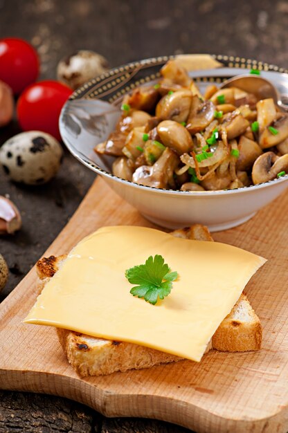 Toast sandwich with mushroom, cheese and parsley, selective focus