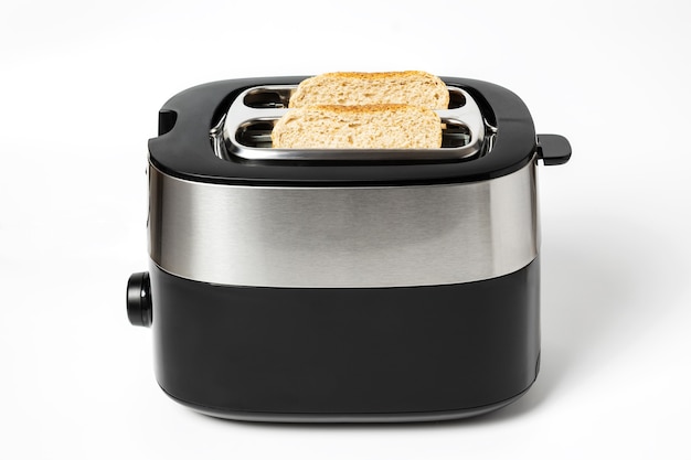 Toast in a toaster in a general plan, on white, isolation, black toaster