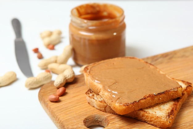 Toast with peanut butter on the table