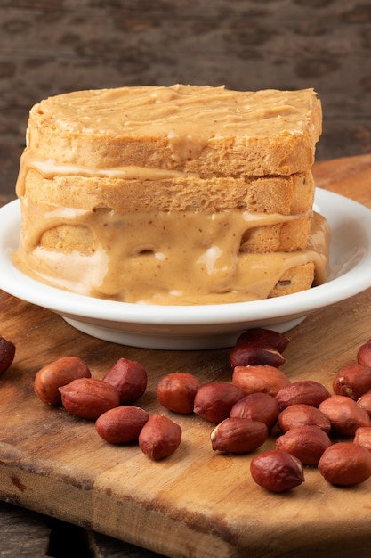 Toasted bread covered with peanut butter