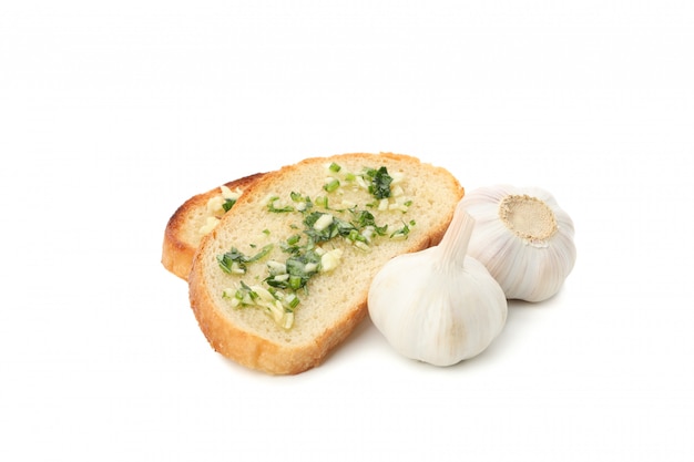 Toasted bread slices with garlic isolated on white