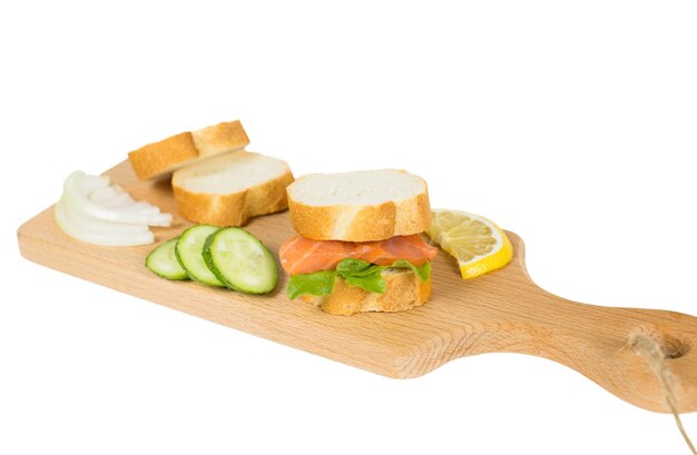 Toasted bread slices with smoked salmon fillet and cream cheese