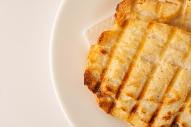 Toasted bread with melted butter Brazilian breakfast food