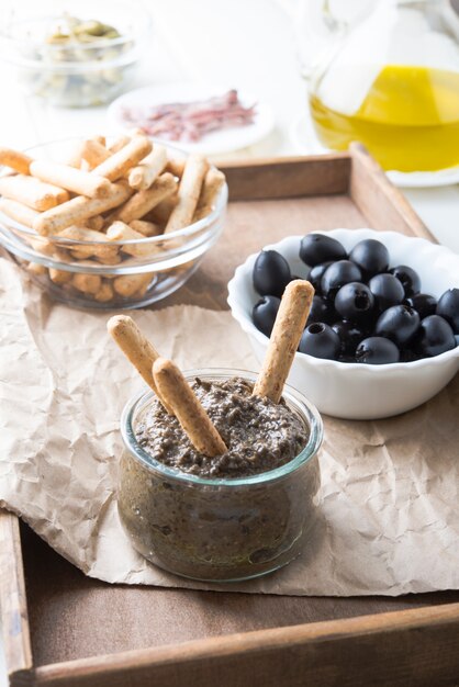 Toasted bread with olive pate