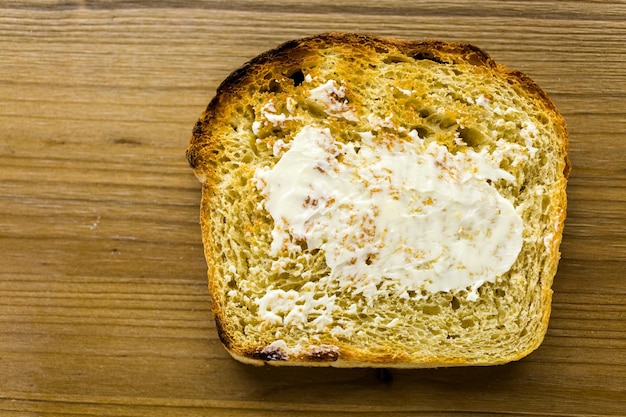 Toasted slices of freshly baked sourdough bread with butter.