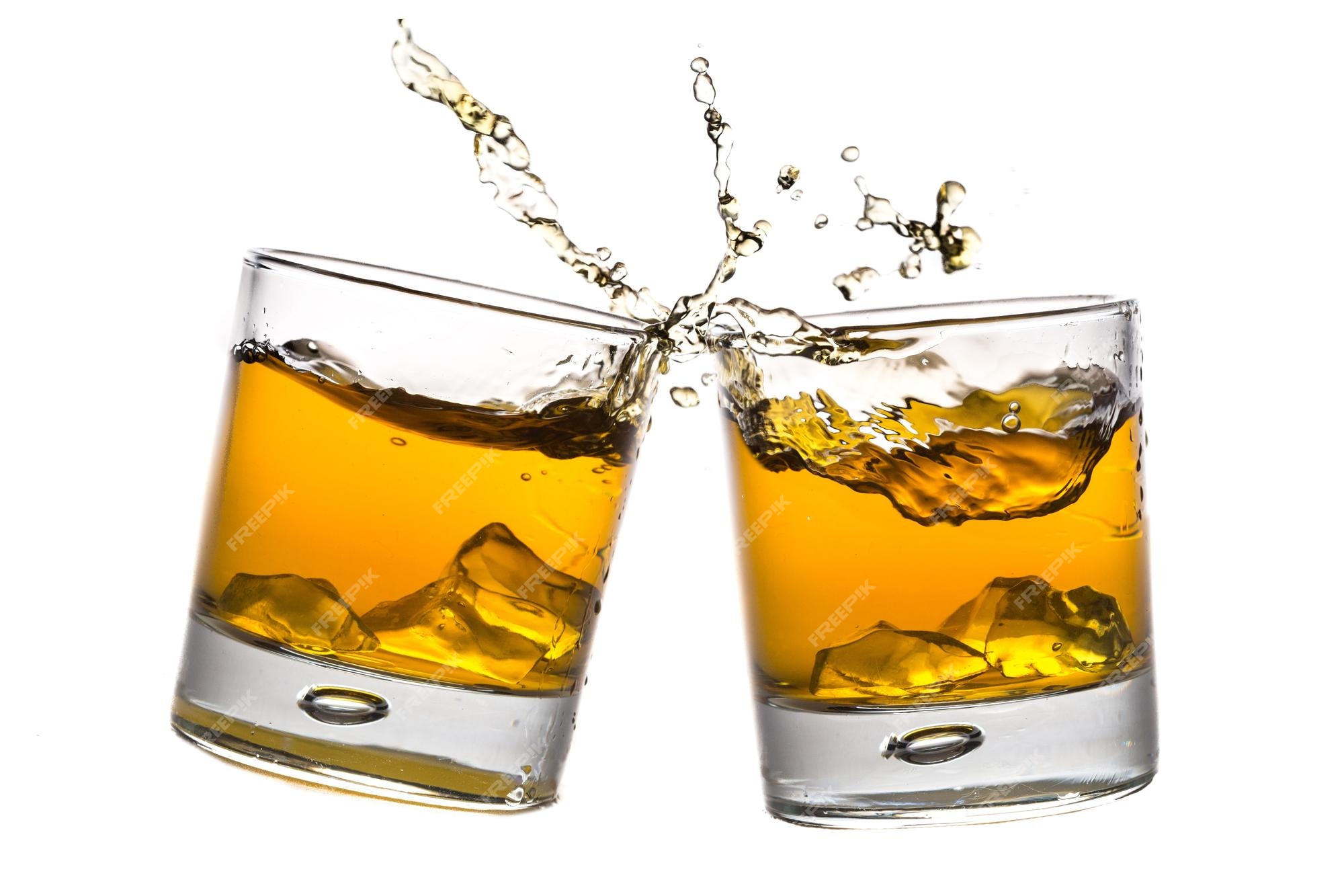 Premium Photo | Toasting whiskey glasses