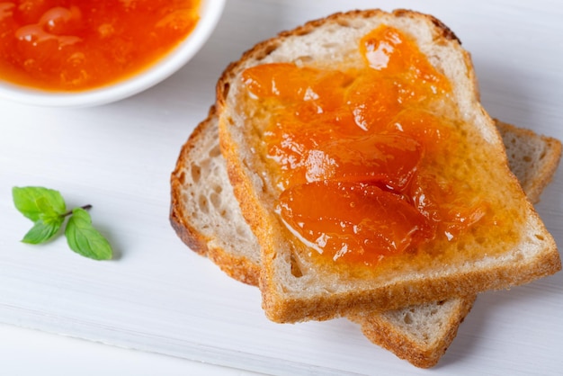 Toasts of bread with apricot jam and fresh fruits with mintx9