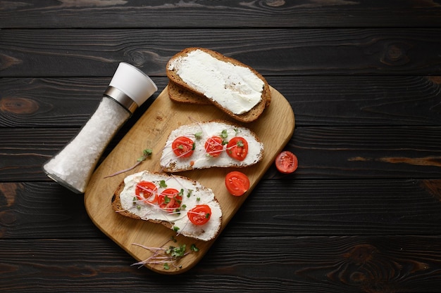 Toasts with microgreens on the table Healthy food vegan food and dieting concept