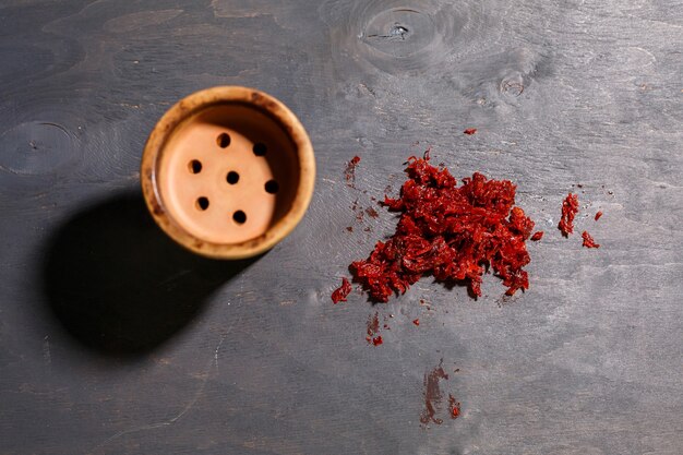 Tobacco for hookah in a clay bowl