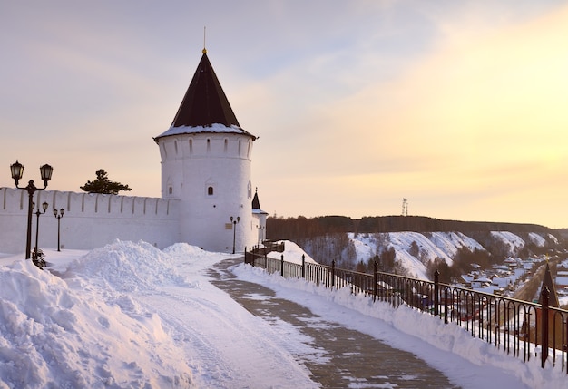 Tobolsk Kremlin in winter White stone fortress walls on a high hill the Southern Round tower