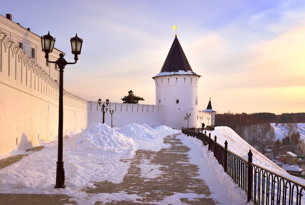 Tobolsk Kremlin in winter White stone fortress walls on a high hill the Southern Round tower