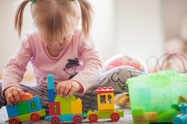 Toddler concentrated on toys