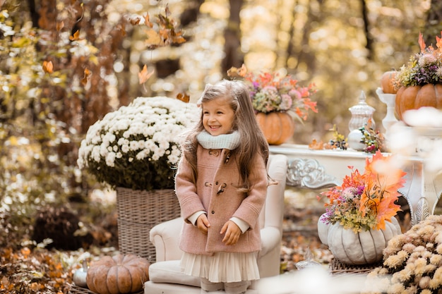 toddler girl in the autumn forest