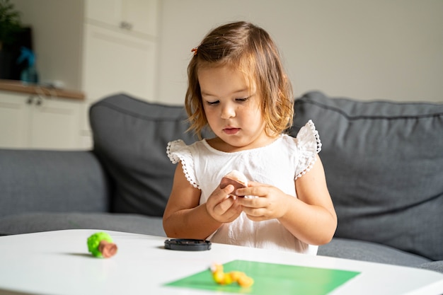 toddler girl playing with toys