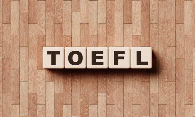 Слова TOEFL из деревянных блоков с буквами Образовательные курсы и тест по английскому языку как концепция иностранного языка рендеринг 3D иллюстрации