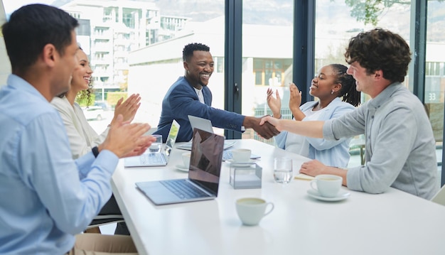 Together well do great things Shot of a young businessman shaking hands with a fellow team member