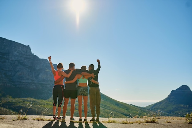 Photo together you can do so much more shot of a fitness group celebrating after a good workout