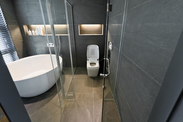 Toilet hotel style with separate toilet space and bath space