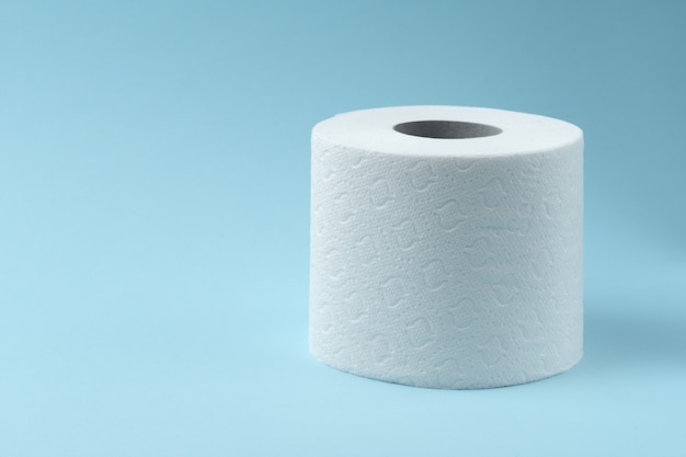 Toilet paper on blue