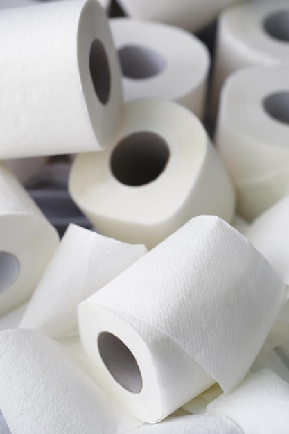 Toilet paper in a roll. Snow-white soft three-layer toilet paper. Lack of hygiene products. Primary protection and disinfection.