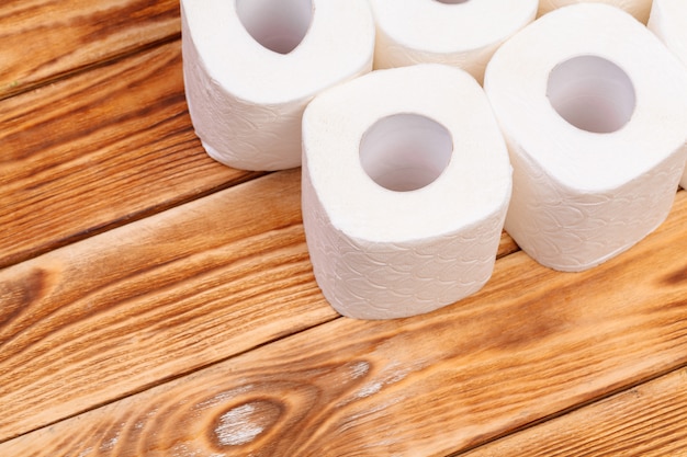 Toilet paper rolls on wooden top view