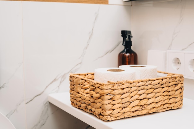 Toilet paper in a straw basket